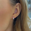 Brandi Bezel Diamond Huggie Earrings on model