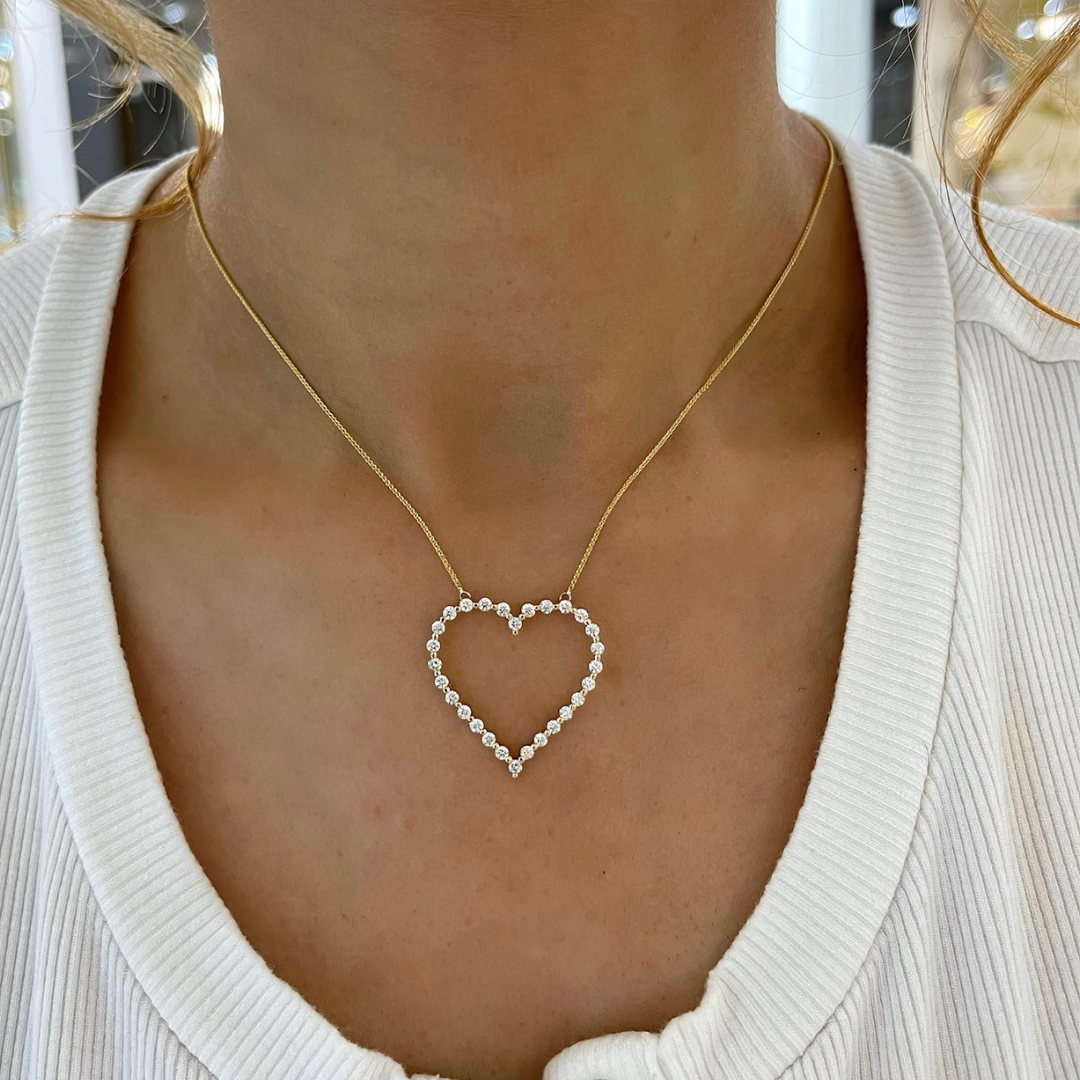 Floating diamond 2025 heart pendant