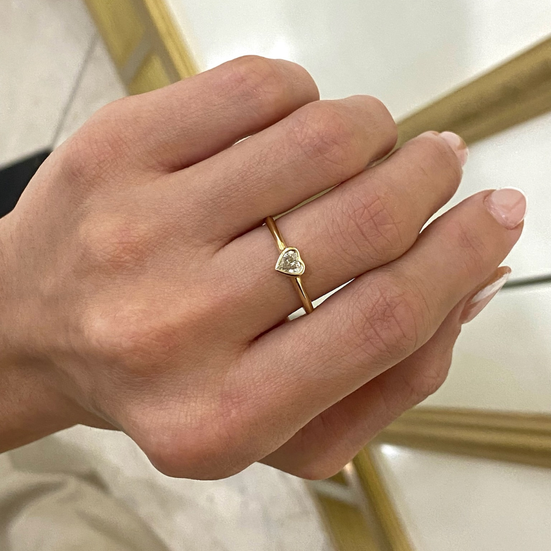 Gold bezel diamond ring online