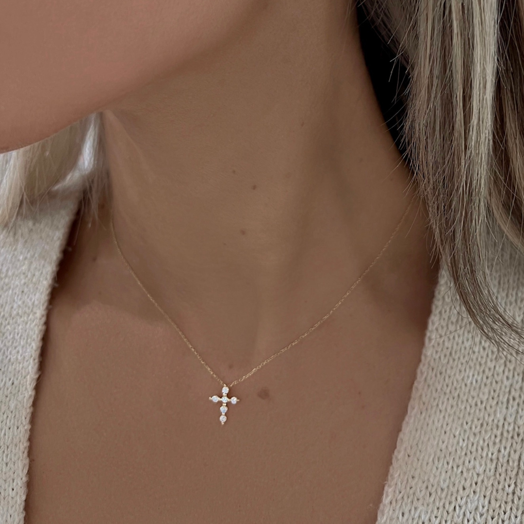 Tiny diamond cross pendant deals