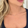 Annabelle Tiny Single Diamond Pendant Necklace on model